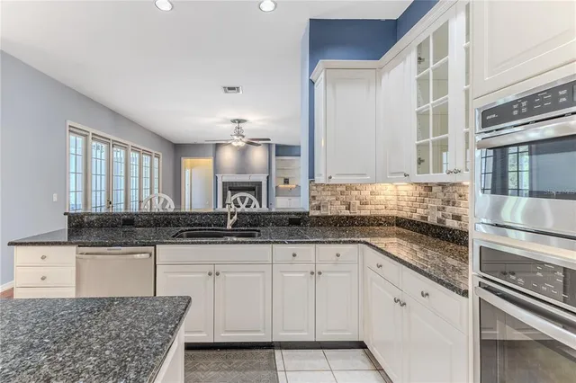 an aerial view of a house with a garden