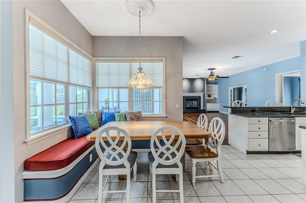 7512 Oak Tree Lane Spring Hill, FL 34607 - Photo 41 of 89 a view of a dining room with furniture window and outside view