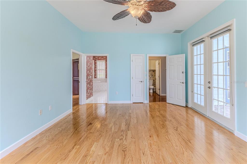 7512 Oak Tree Lane Spring Hill, FL 34607 - Photo 50 of 89 wooden floor in an empty room with a window