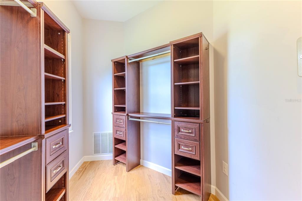 7512 Oak Tree Lane Spring Hill, FL 34607 - Photo 52 of 89 a view of walk in closet with empty racks