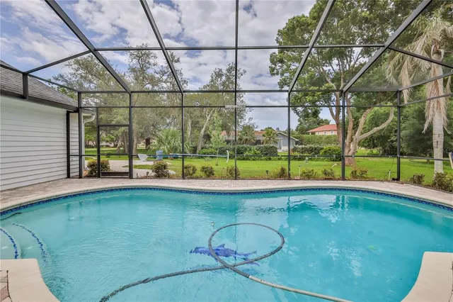 $550,000 | 7512 Oak Tree Lane, Spring Hill, FL 34607