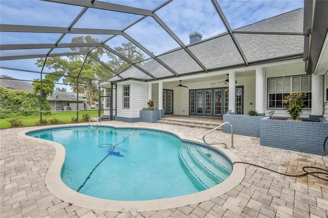 $550,000 | 7512 Oak Tree Lane, Spring Hill, FL 34607