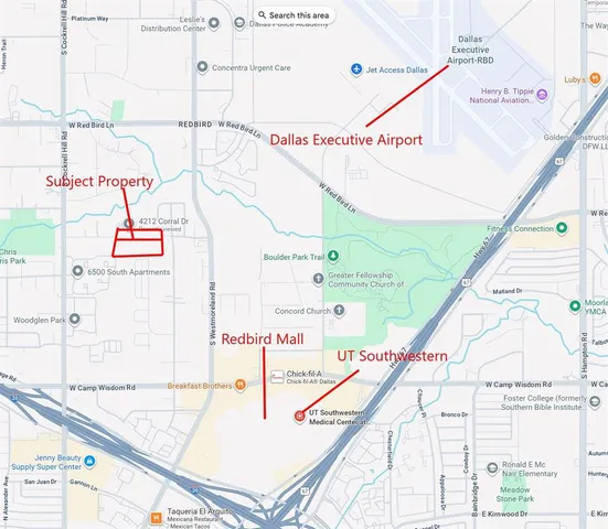 an aerial view of green landscape with trees houses and mountain view