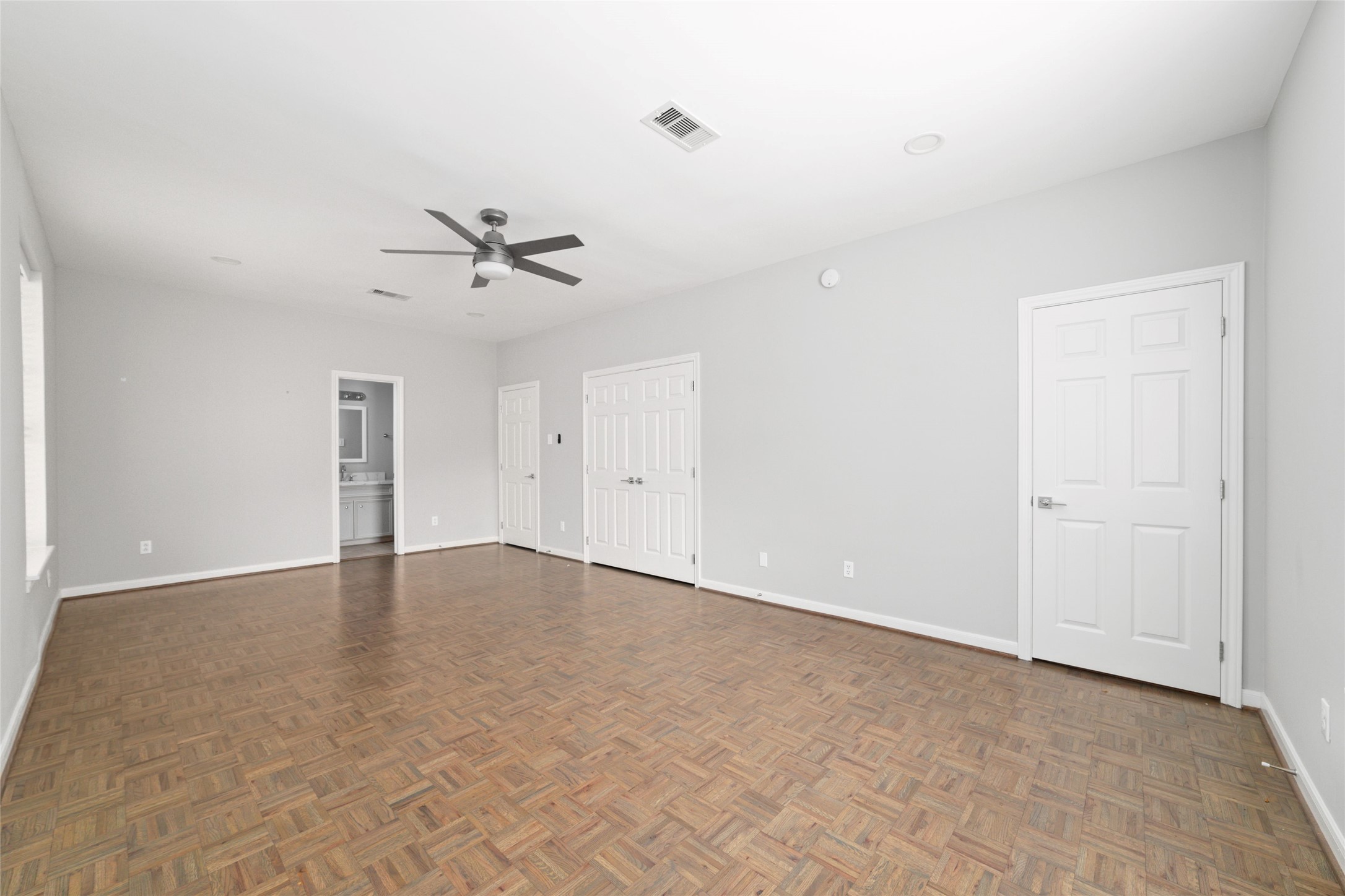 1516 Park Street, Unit B Houston, TX 77019 - Photo 11 of 20 a view of an empty room with a ceiling fan