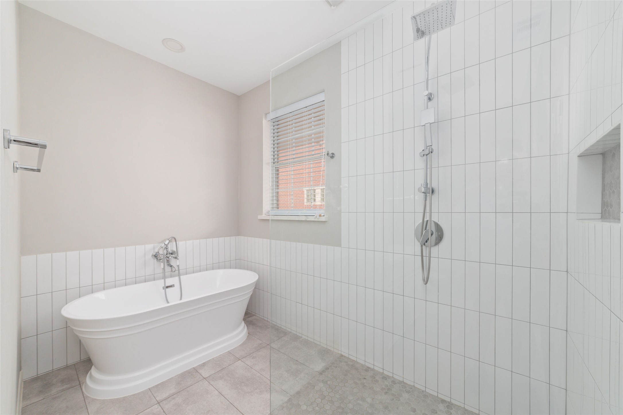 1516 Park Street, Unit B Houston, TX 77019 - Photo 17 of 20 a white bath tub sitting in a bathroom