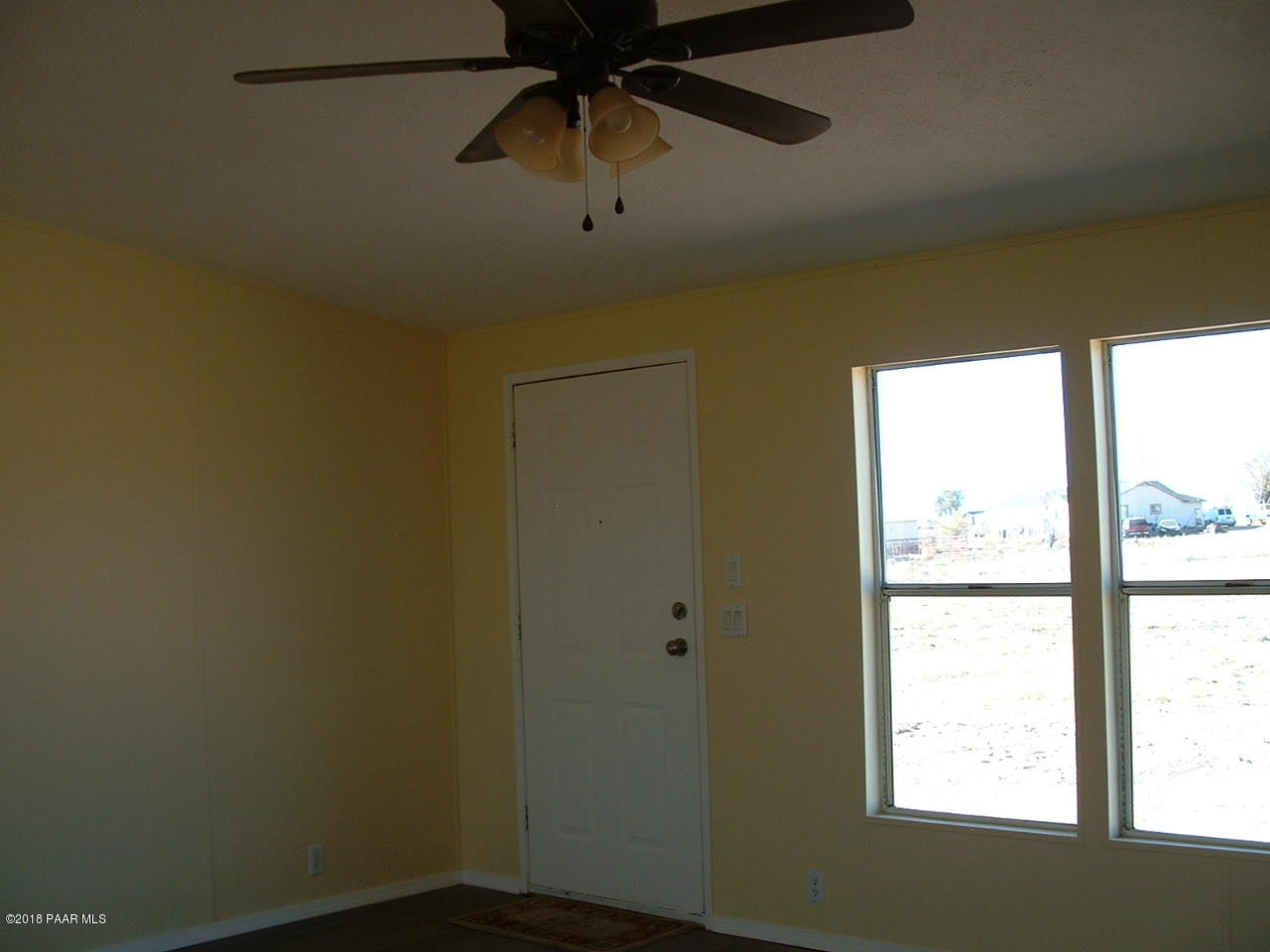 1725 West Big Sky Ranch Road Paulden, AZ 86334 - Photo 18 of 30 a view of a window in an empty room