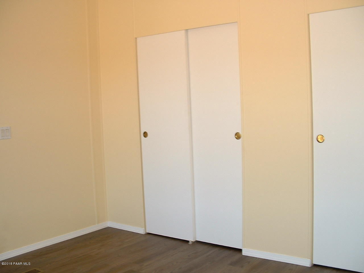 1725 West Big Sky Ranch Road Paulden, AZ 86334 - Photo 19 of 30 a view of a small space with wooden floor