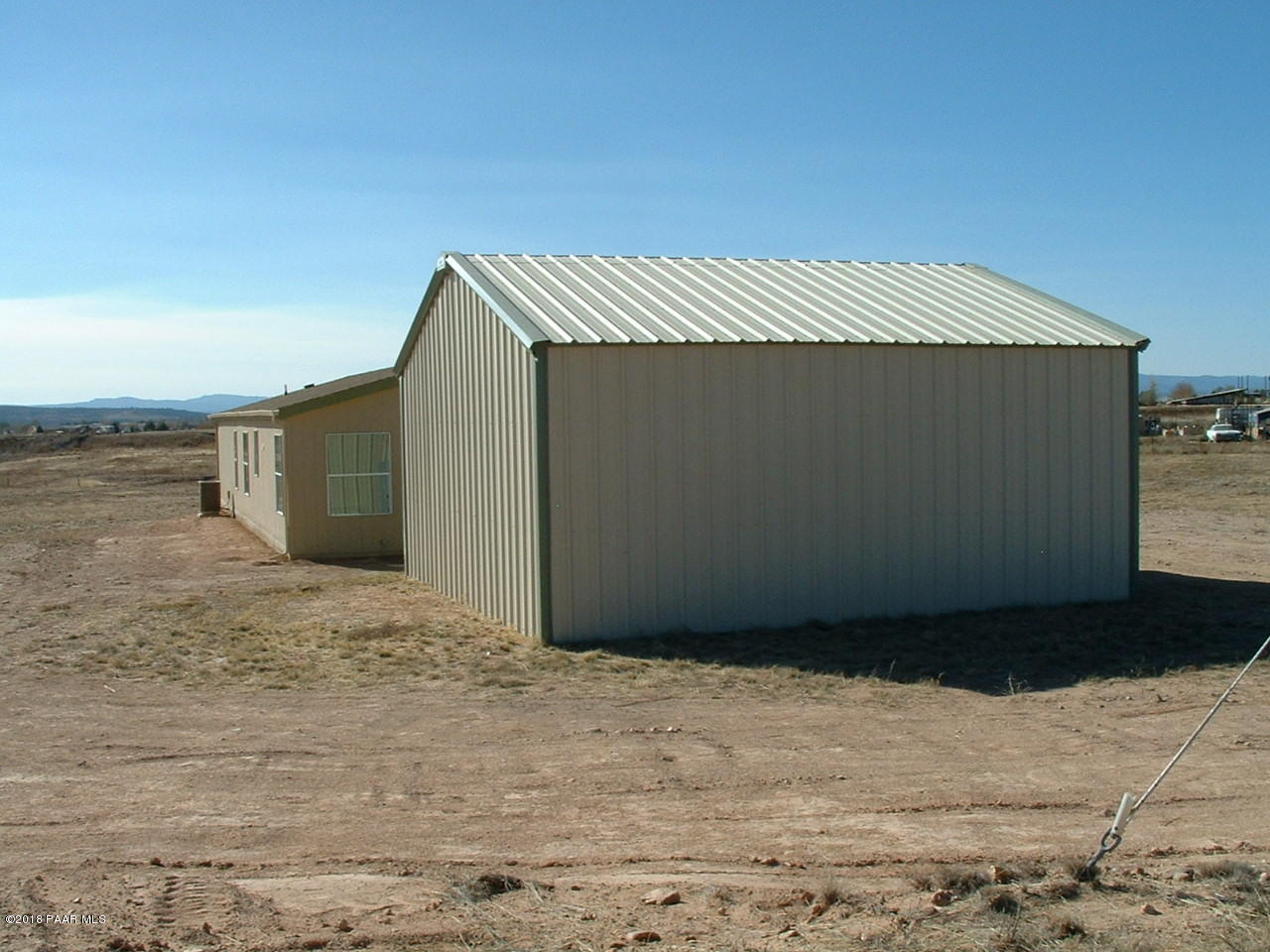 1725 West Big Sky Ranch Road Paulden, AZ 86334 - Photo 10 of 30 a view of a wooden door