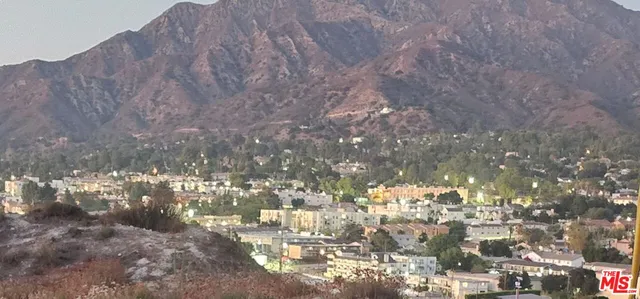 a view of outdoor space and a yard
