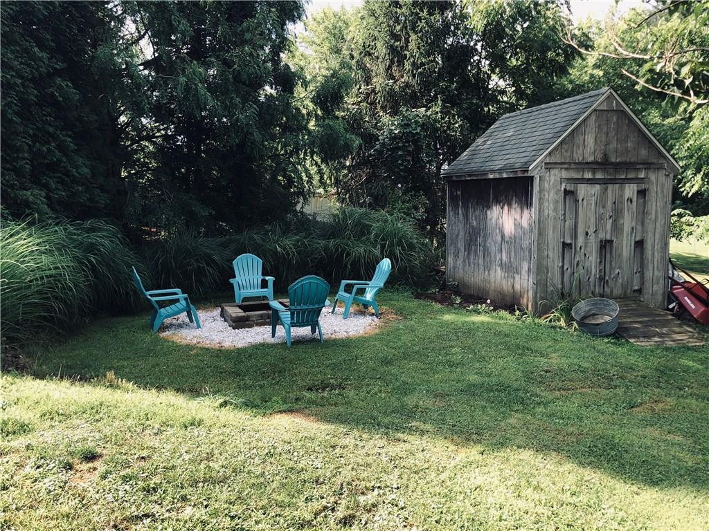 310 McJunkin Road Pittsburgh, PA 15239 - Photo 20 of 20 Rear yard. Storage Shed as-is. Firepit.
