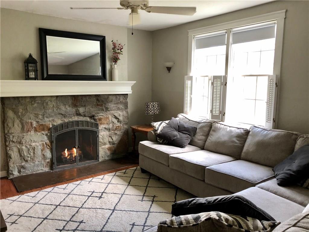 310 McJunkin Road Pittsburgh, PA 15239 - Photo 10 of 20 Living Room with stone fireplace