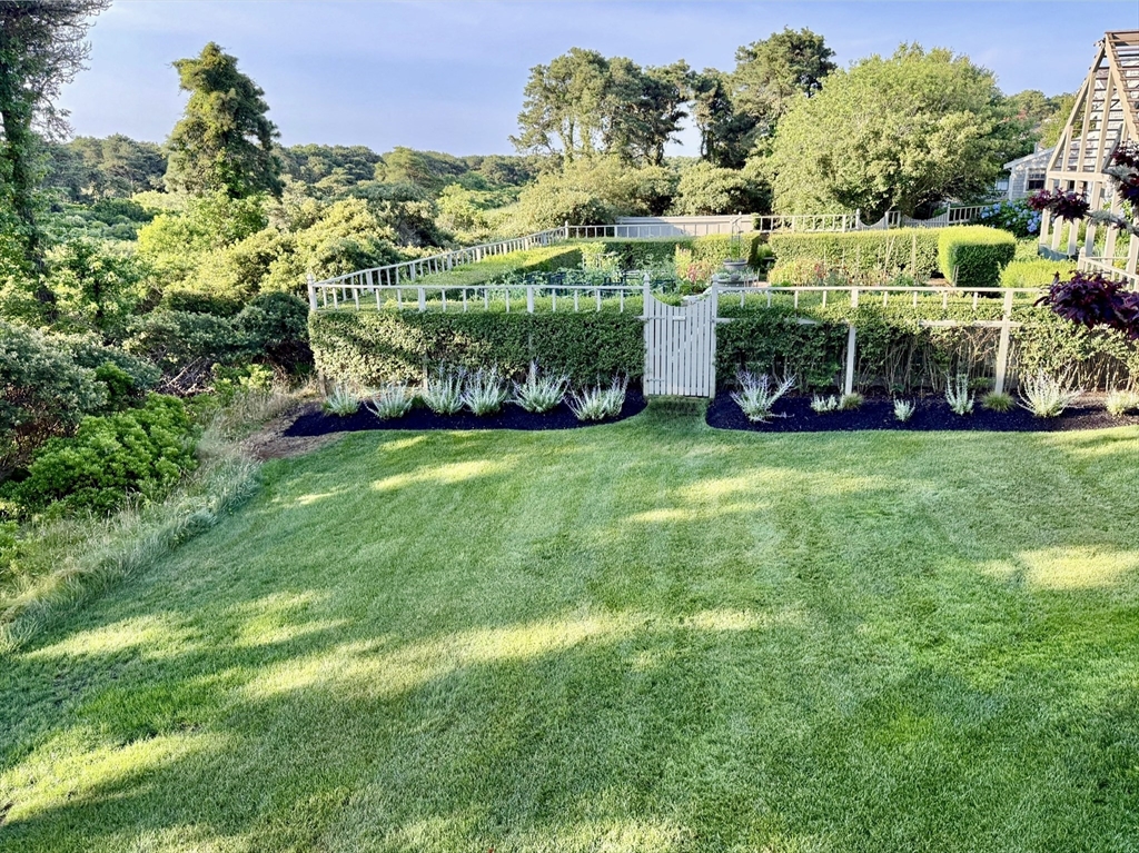 1 A Pochick Avenue Nantucket, MA 02554 - Photo 11 of 41 a view of an house with backyard and garden