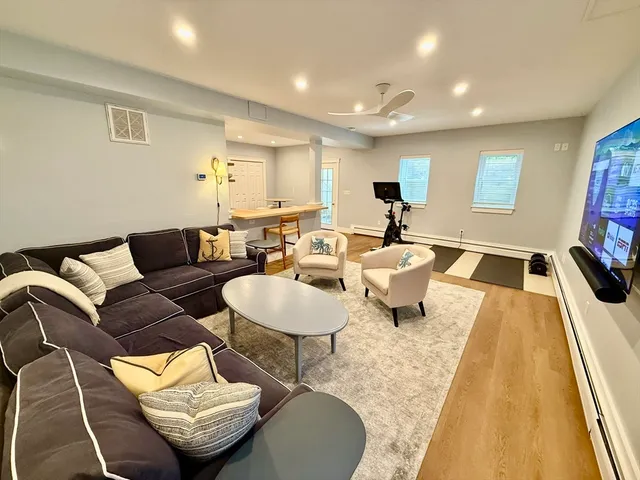 a living room with furniture and a table