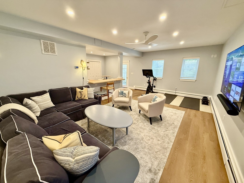 1 A Pochick Avenue Nantucket, MA 02554 - Photo 22 of 41 a living room with furniture and a wooden floor