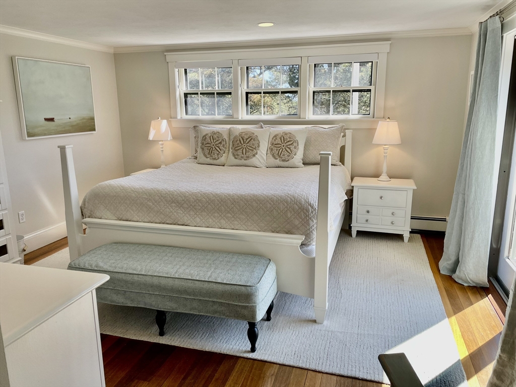 1 A Pochick Avenue Nantucket, MA 02554 - Photo 25 of 41 a bedroom with a bed and a night stand