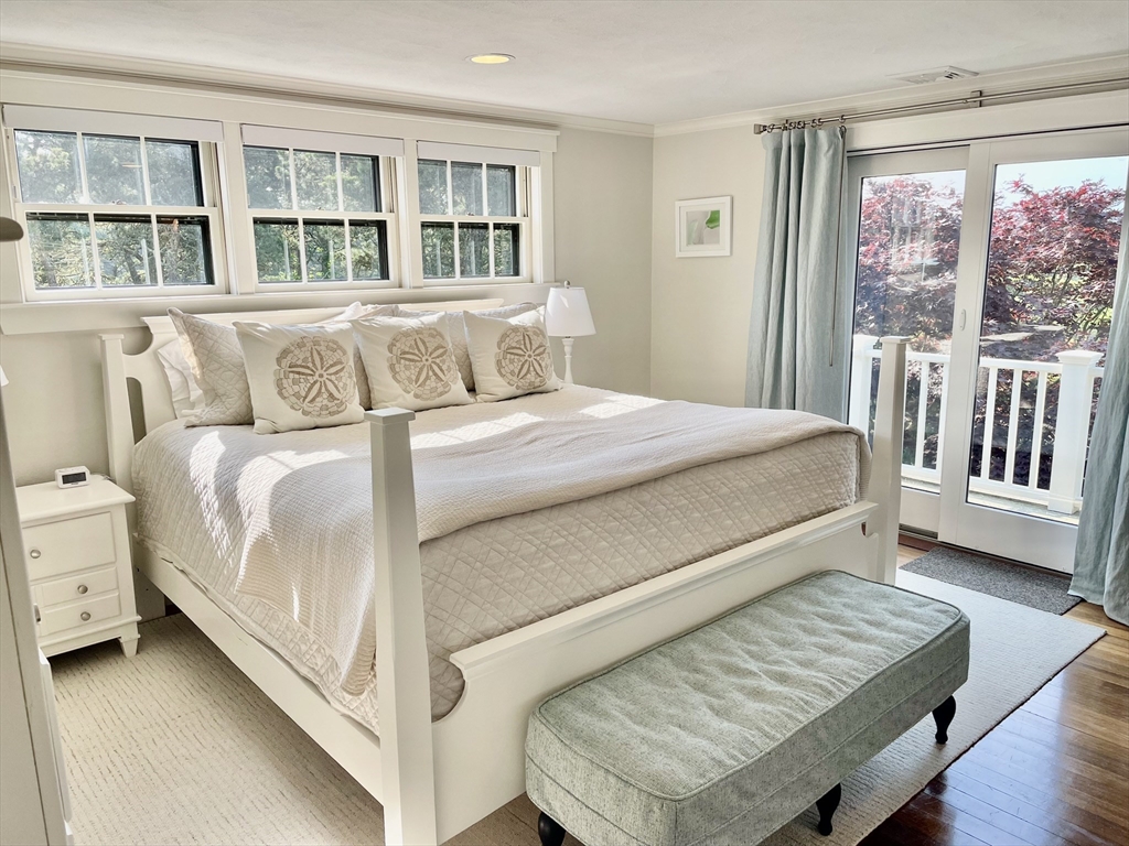 1 A Pochick Avenue Nantucket, MA 02554 - Photo 26 of 41 a bedroom with a bed and a large window