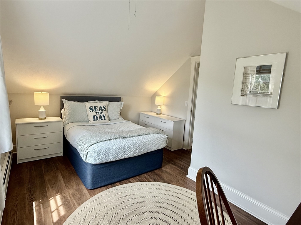 1 A Pochick Avenue Nantucket, MA 02554 - Photo 35 of 41 a bedroom with bed and a night stand