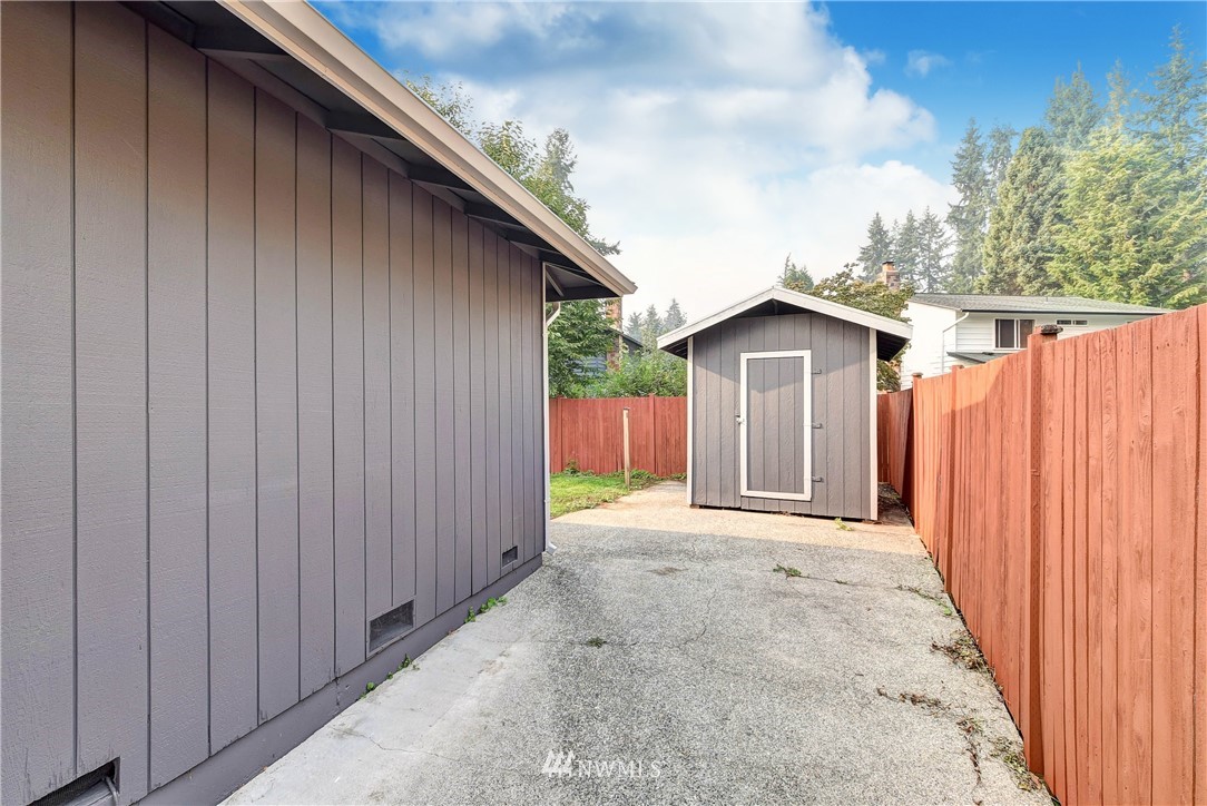 2623 171st Street Southeast Bothell, WA 98012 - Photo 23 of 26 a view of a house with wooden walls