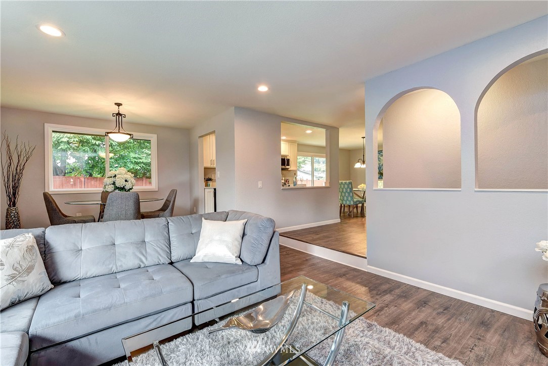 2623 171st Street Southeast Bothell, WA 98012 - Photo 4 of 26 a living room with furniture and a large window