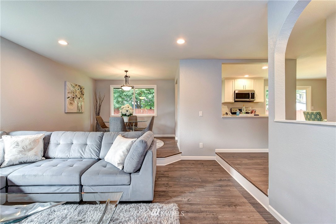 2623 171st Street Southeast Bothell, WA 98012 - Photo 6 of 26 a living room with furniture and a large window