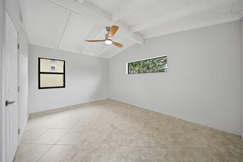 a view of hallway with closet