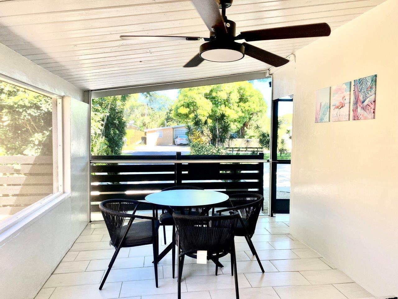 462 Hastings Street Boca Raton, FL 33487 - Photo 26 of 28 a dining room with furniture and window