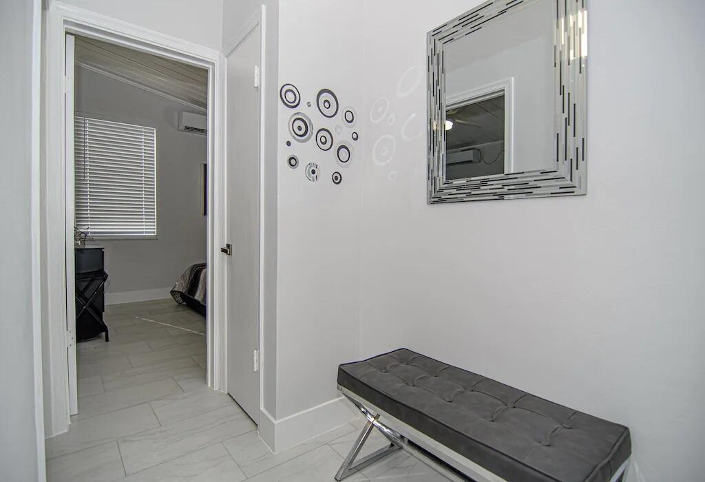 462 Hastings Street Boca Raton, FL 33487 - Photo 28 of 28 a room with a door and a chair