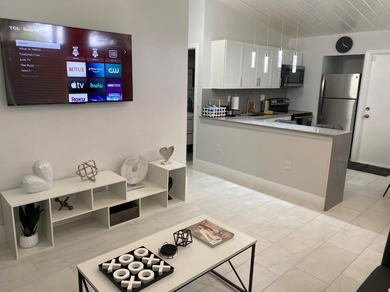 462 Hastings Street Boca Raton, FL 33487 - Photo 4 of 28 a kitchen with stainless steel appliances granite countertop a refrigerator sink and stove