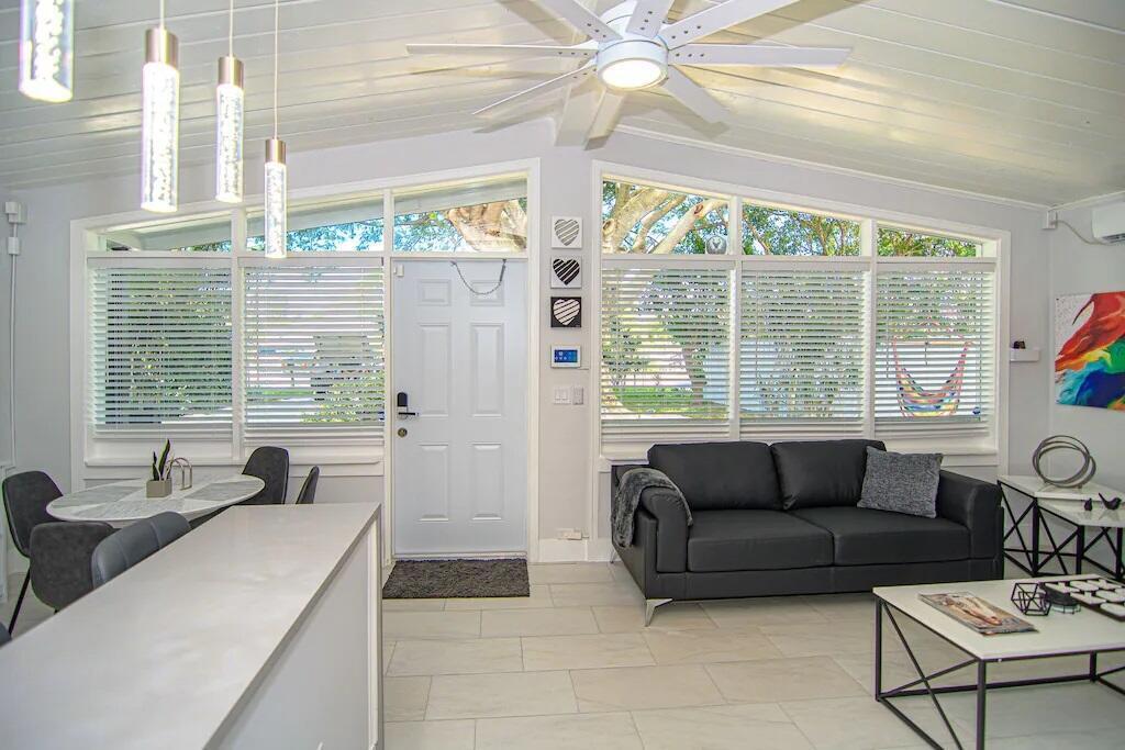 462 Hastings Street Boca Raton, FL 33487 - Photo 5 of 28 a living room with furniture and a large window