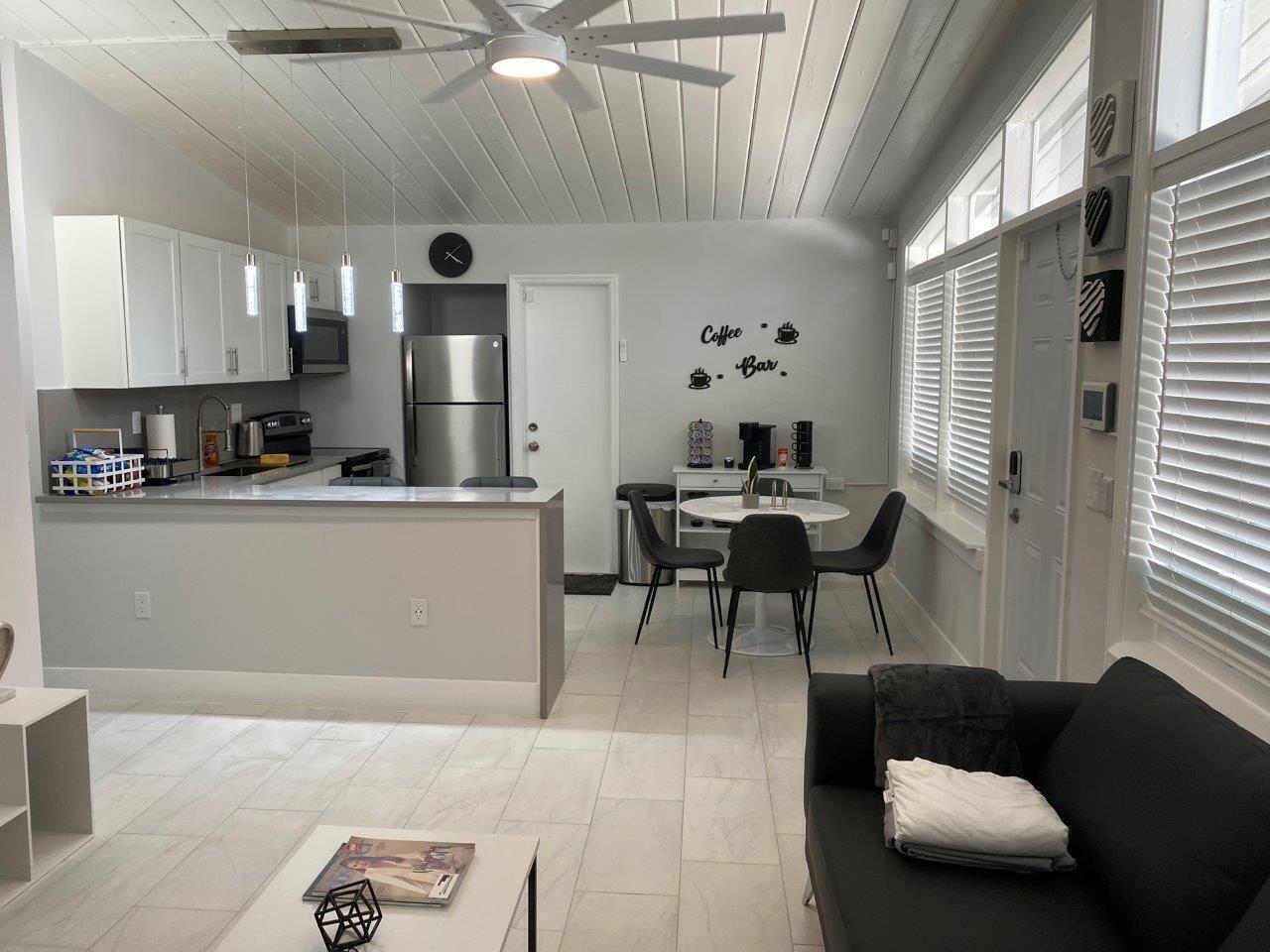 462 Hastings Street Boca Raton, FL 33487 - Photo 7 of 28 a living room with furniture and a window