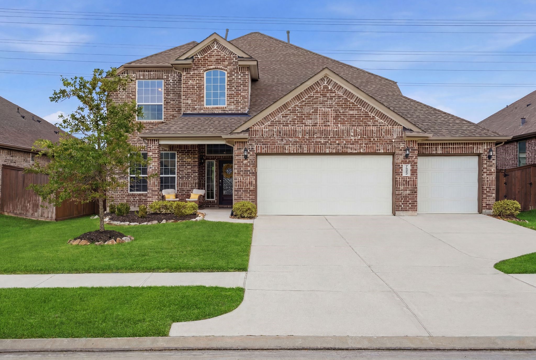 7522 Windsor View Drive Spring, TX 77379 - Photo 1 of 49 Well-kept exterior with lush green lawn and a warm, inviting entrance.