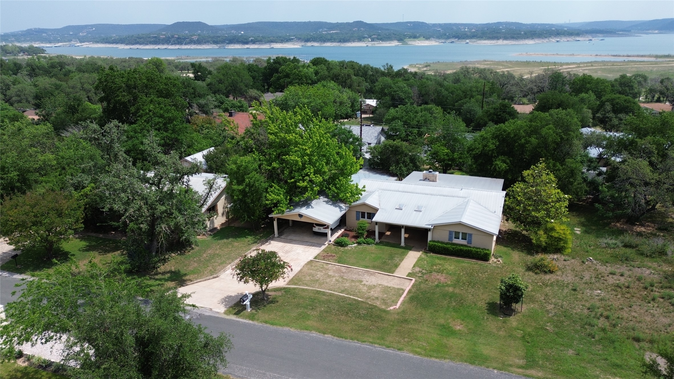 5609 Arroyo Road Austin, TX 78734 - Photo 1 of 1 Aerial view featuring a water view