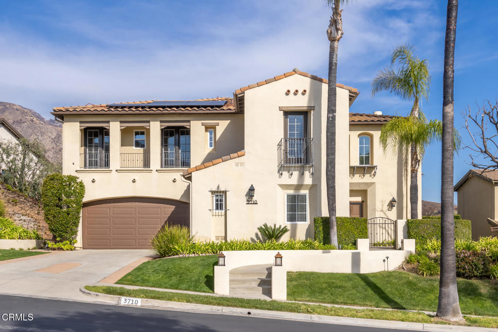 3710 Sunset Ridge Road Altadena, CA 91001 - Photo 2 of 45 a front view of a house with a garden