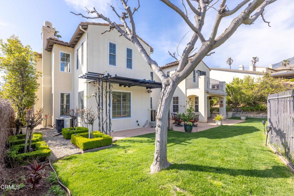 3710 Sunset Ridge Road Altadena, CA 91001 - Photo 38 of 45 a view of a white house next to a yard with big trees