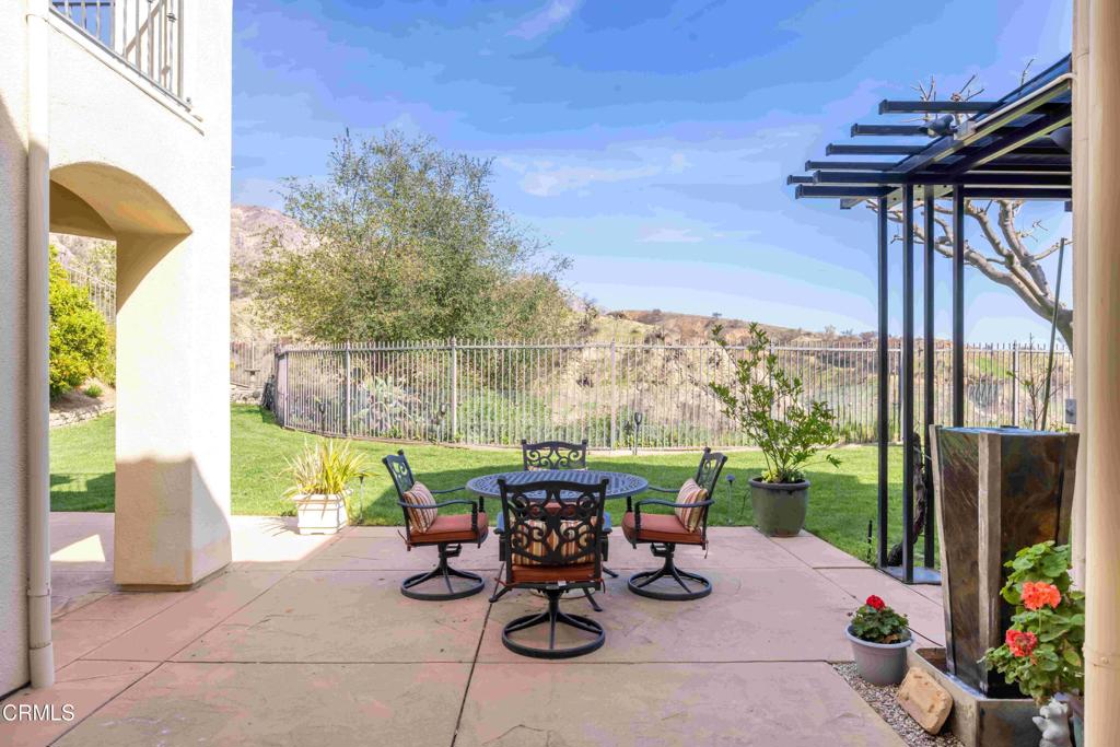 3710 Sunset Ridge Road Altadena, CA 91001 - Photo 41 of 45 a view of a patio with a table chairs and a potted plants