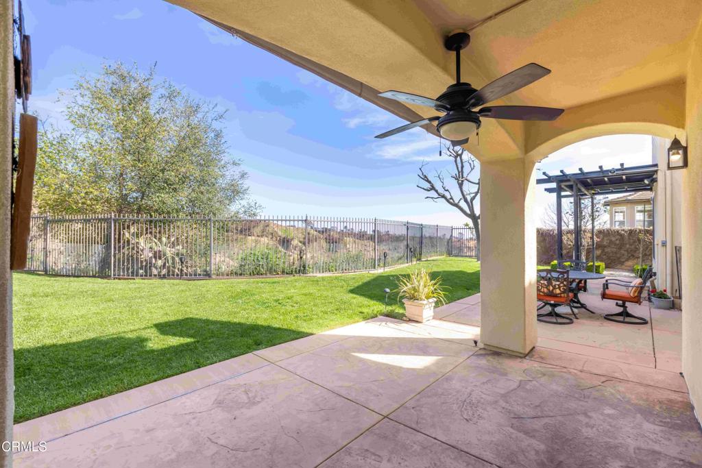 3710 Sunset Ridge Road Altadena, CA 91001 - Photo 43 of 45 a view of a patio with a table and chairs under an umbrella