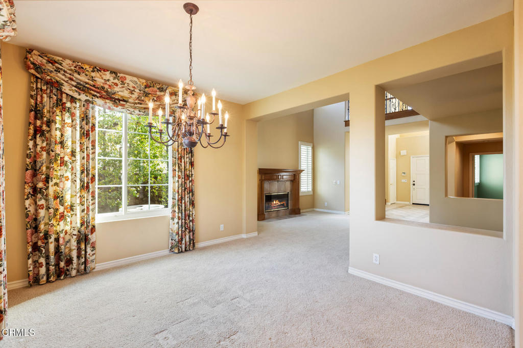 3710 Sunset Ridge Road Altadena, CA 91001 - Photo 8 of 45 a view of a room with windows and chandelier
