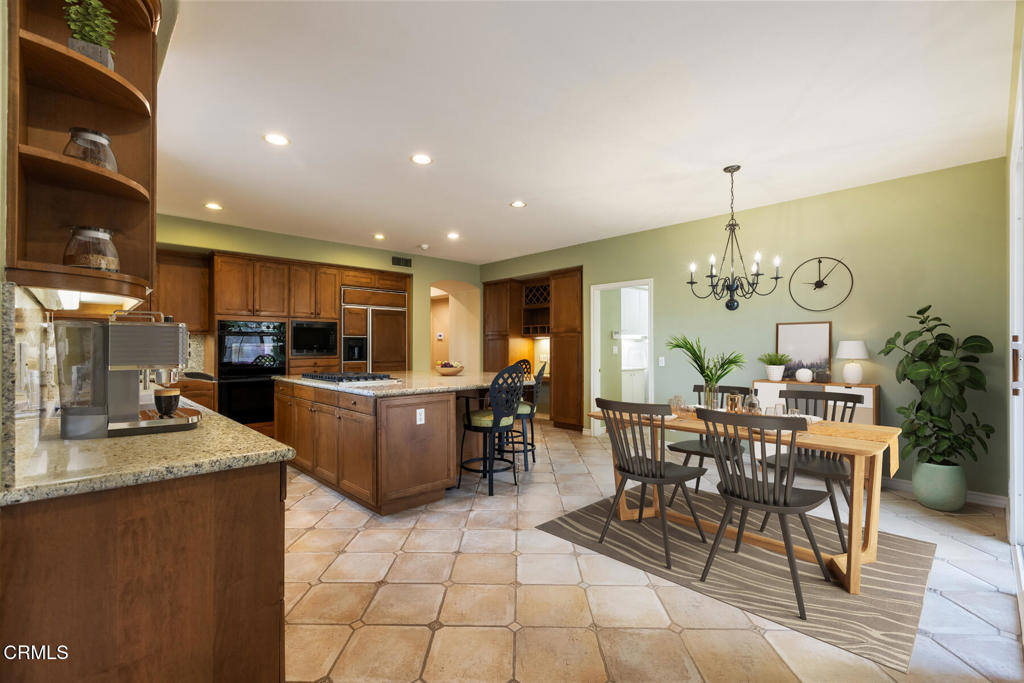 3710 Sunset Ridge Road Altadena, CA 91001 - Photo 9 of 45 a kitchen with a sink a counter top space and appliances