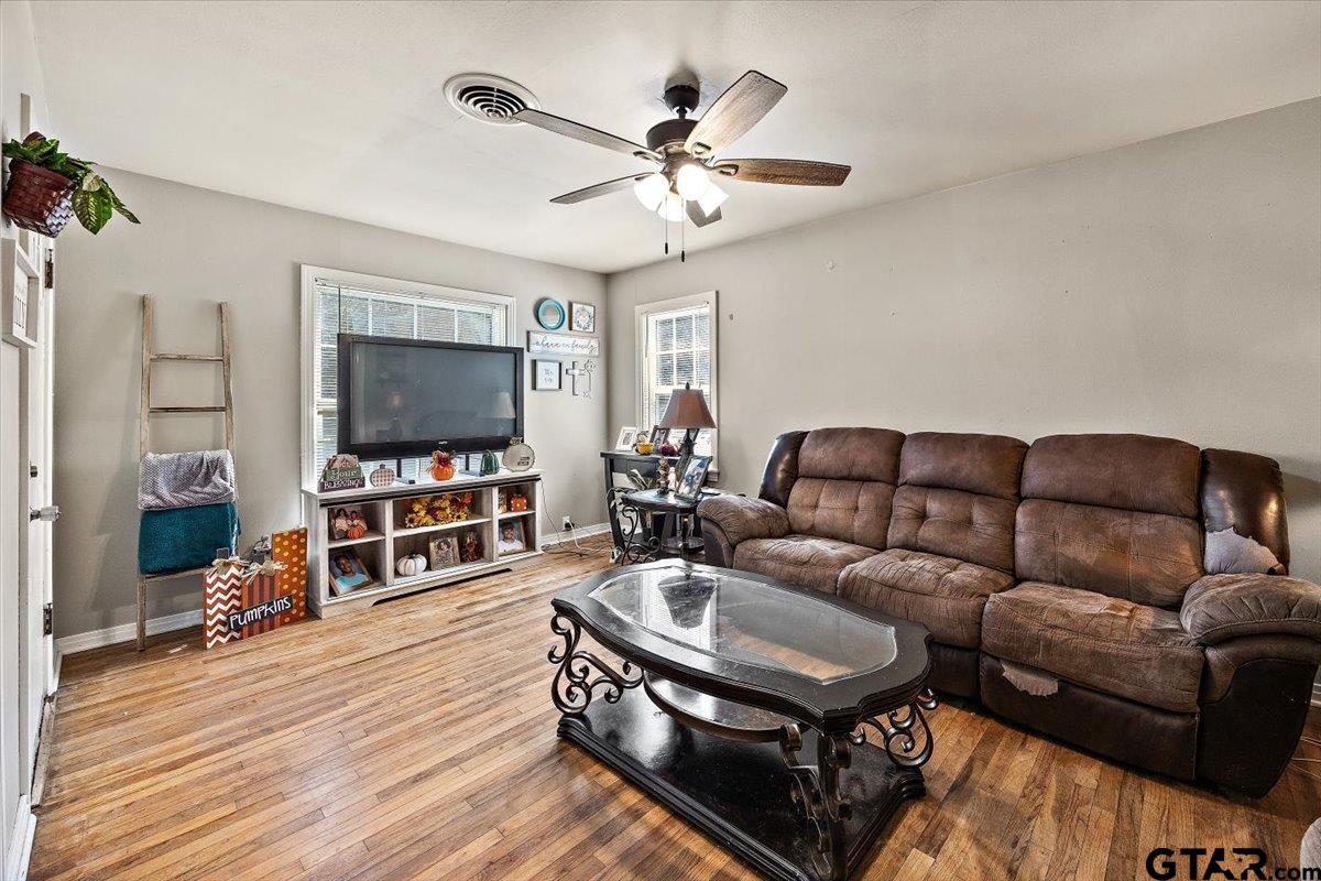 228 Fairview Street Rusk, TX 75785 - Photo 11 of 35 a living room with furniture and a flat screen tv