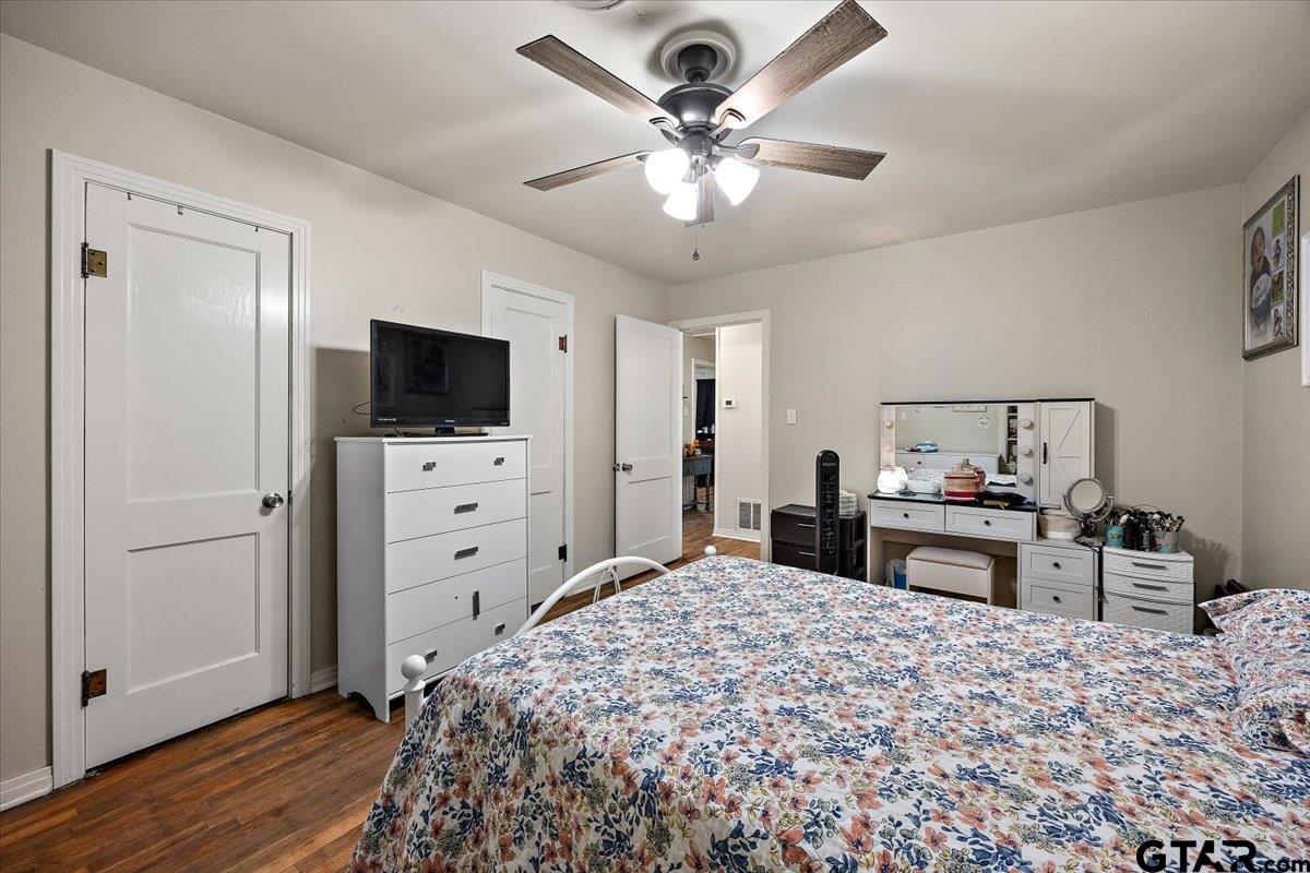 228 Fairview Street Rusk, TX 75785 - Photo 20 of 35 a bedroom with a bed and a flat screen tv