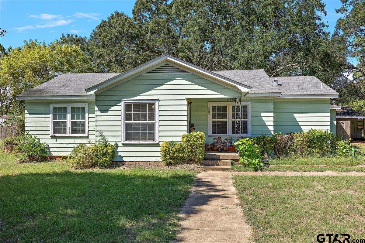 228 Fairview Street Rusk, TX 75785 - Photo 2 of 35 a front view of a house with garden