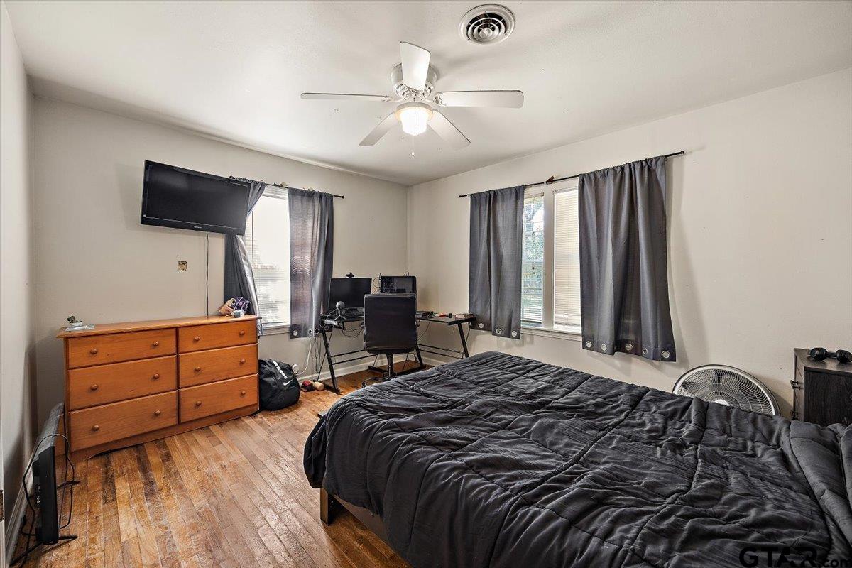 228 Fairview Street Rusk, TX 75785 - Photo 22 of 35 a bedroom with a bed and a flat screen tv