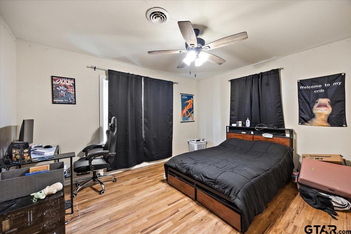 228 Fairview Street Rusk, TX 75785 - Photo 24 of 35 a view of a workspace with furniture and gym equipment