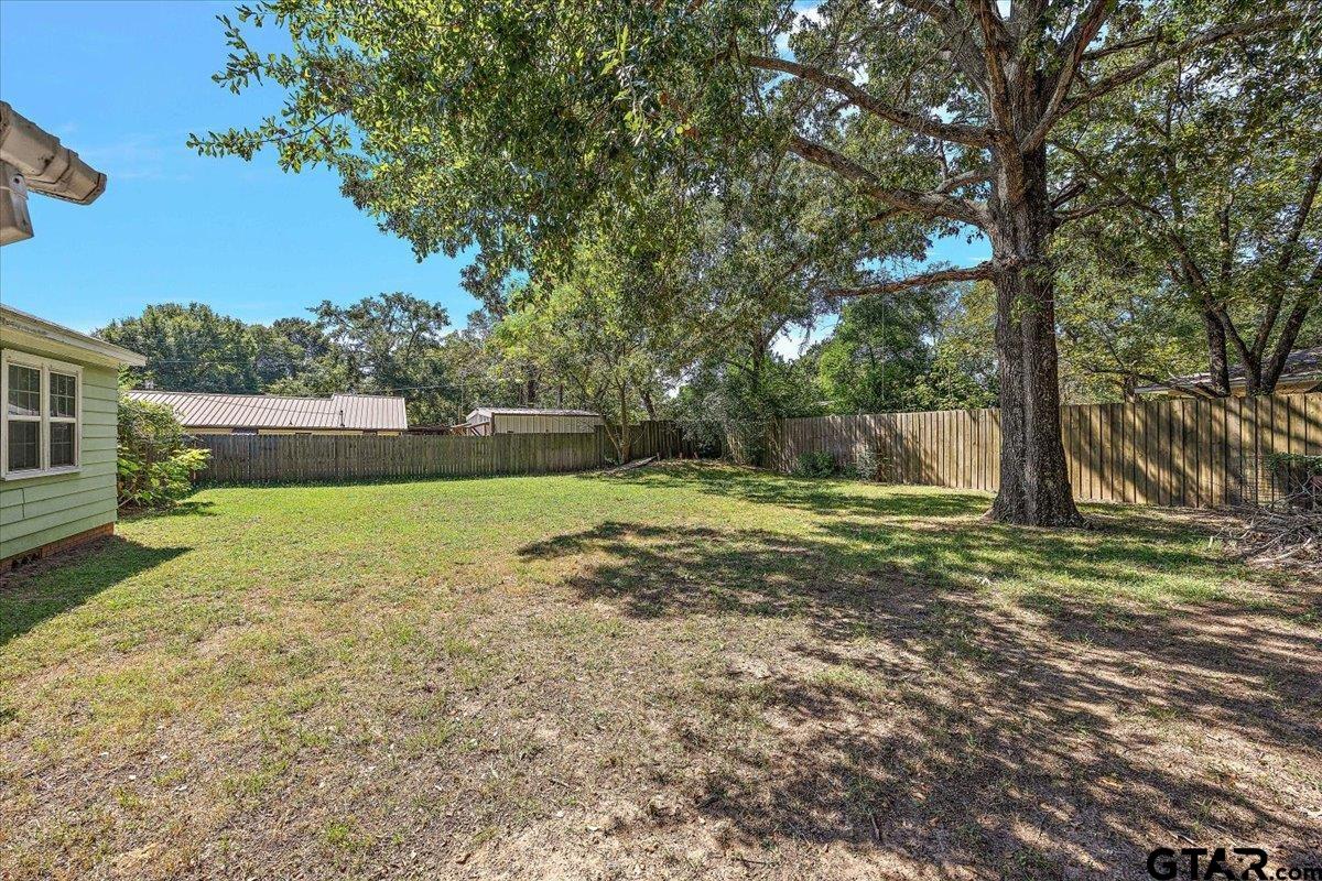 228 Fairview Street Rusk, TX 75785 - Photo 35 of 35 a view of a yard with a tree