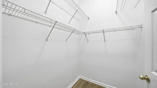 a view of a room with racks on the wall