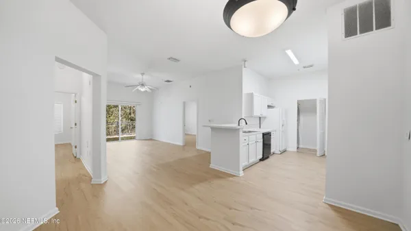 a view of kitchen and windows