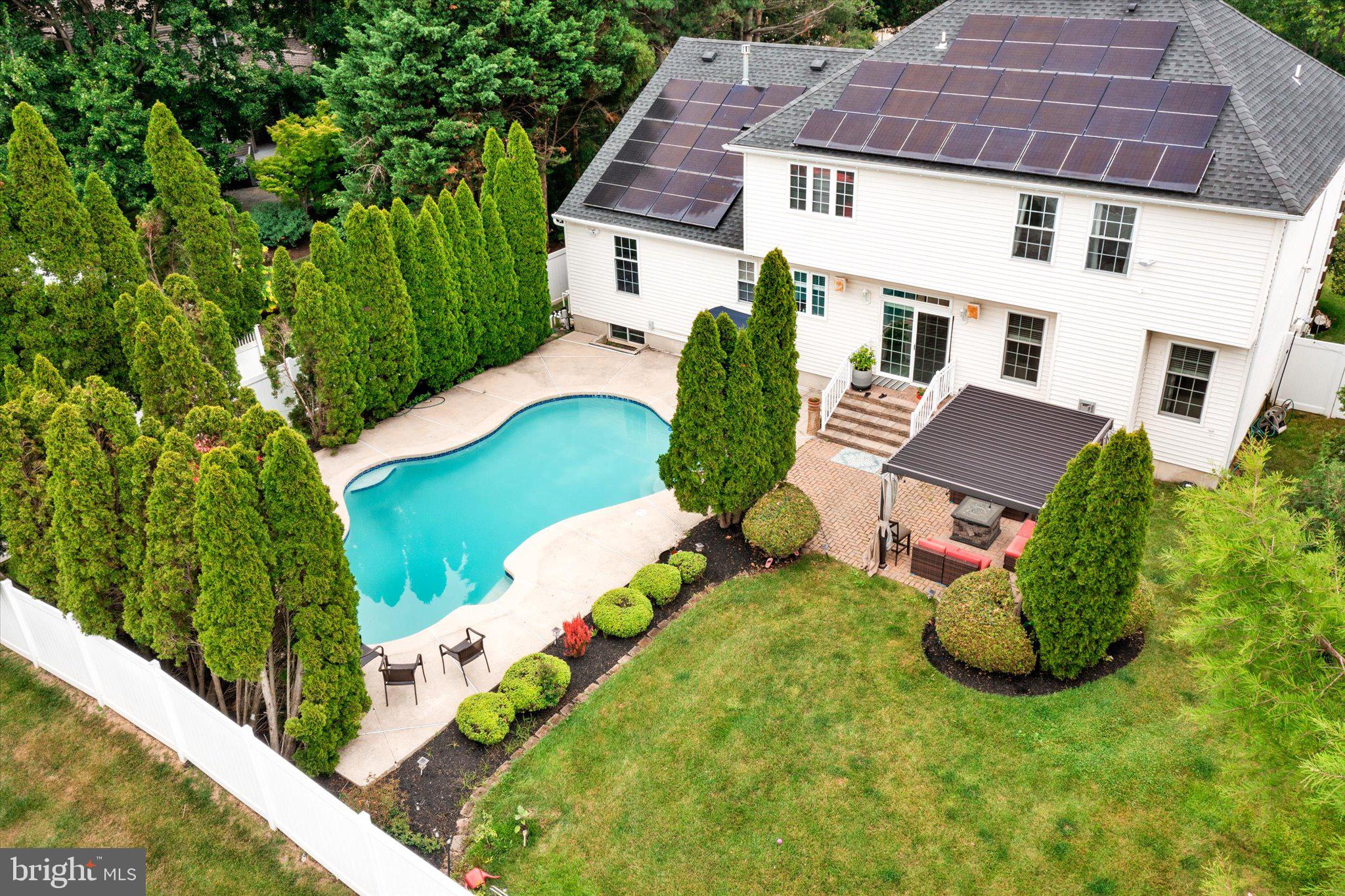 12 Wendover Road East Windsor, NJ 08520 - Photo 42 of 51 Serene backyard oasis with pool.