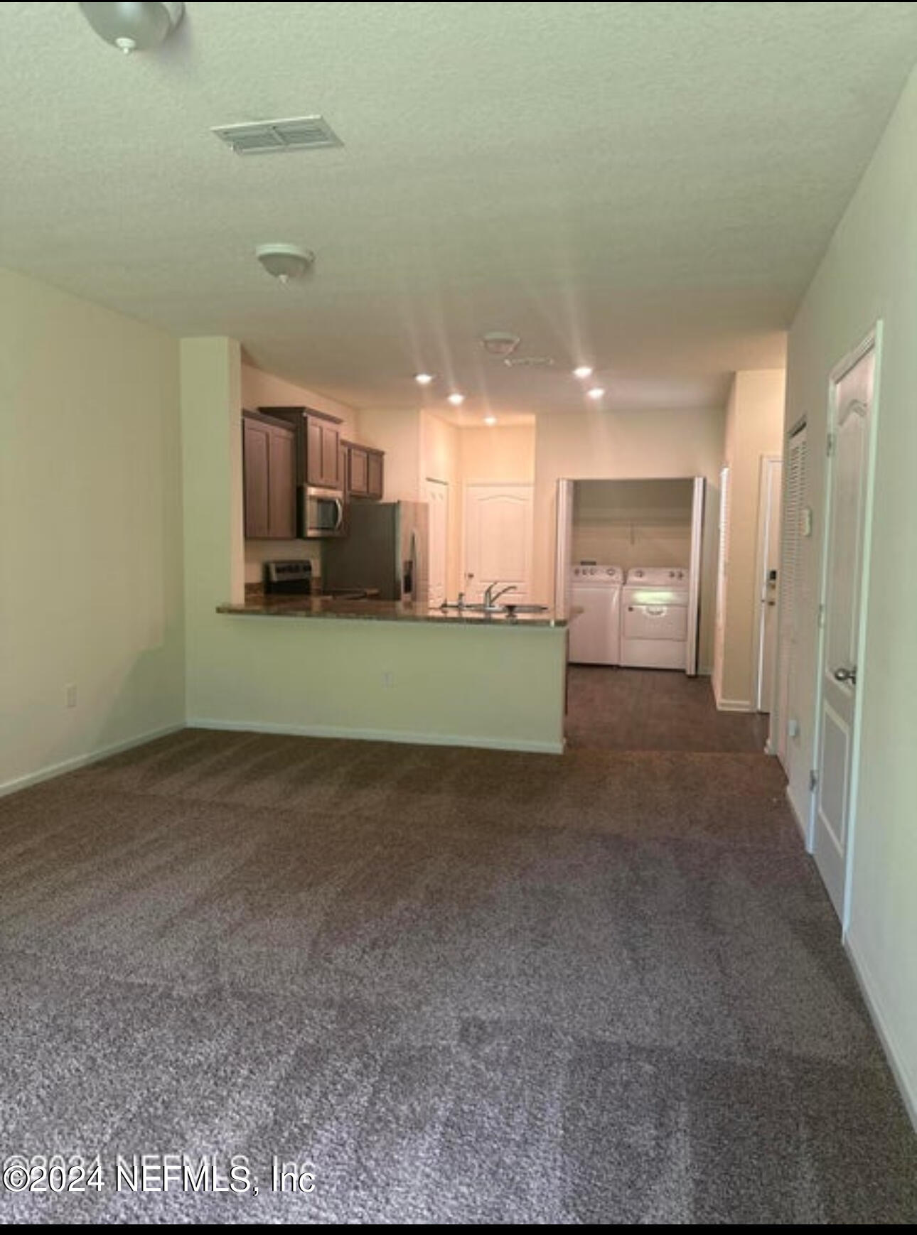 7945 Echo Springs Road Jacksonville, FL 32256 - Photo 3 of 10 a view of a kitchen and a window