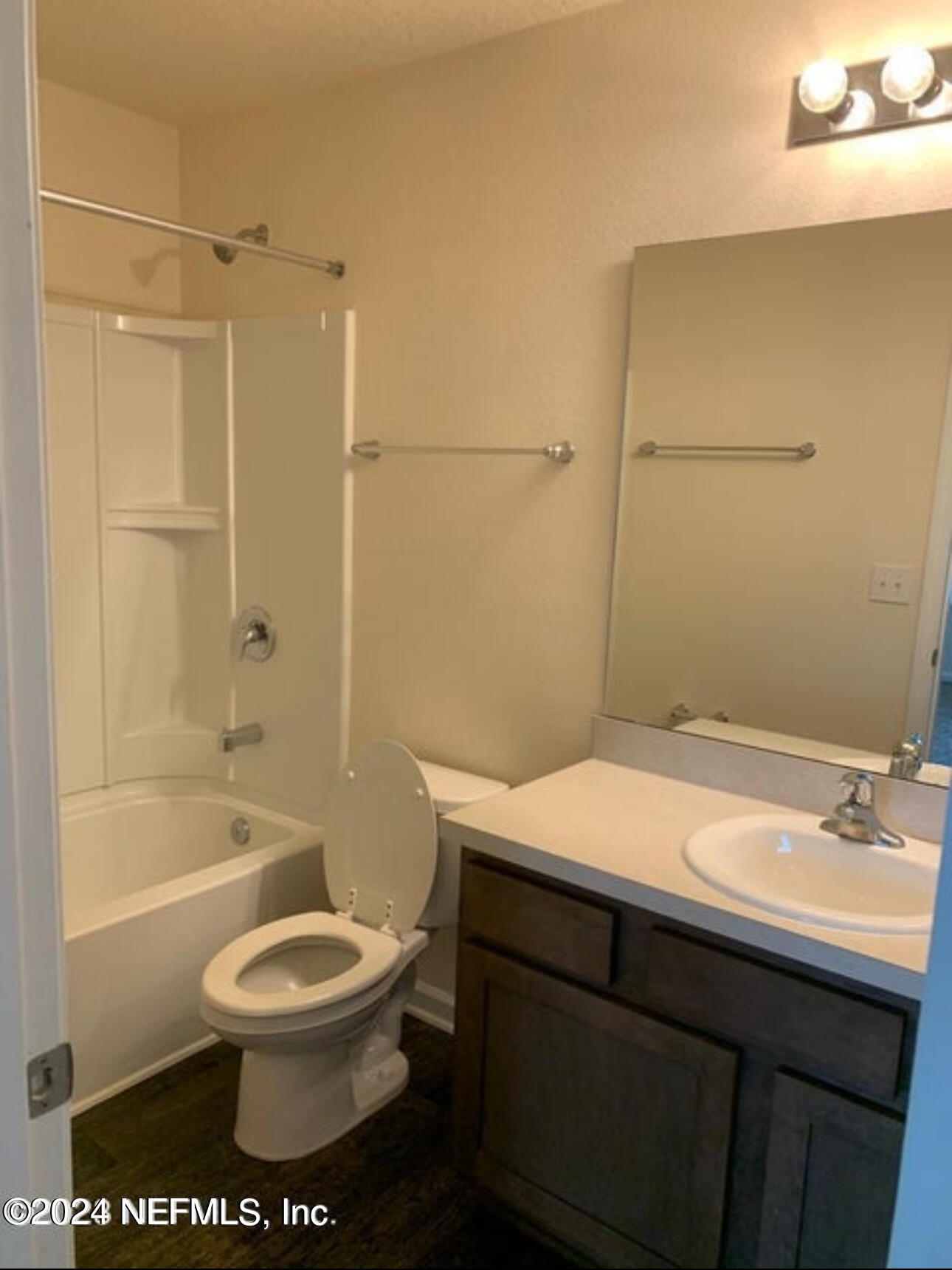 7945 Echo Springs Road Jacksonville, FL 32256 - Photo 10 of 10 a bathroom with a sink a toilet and shower