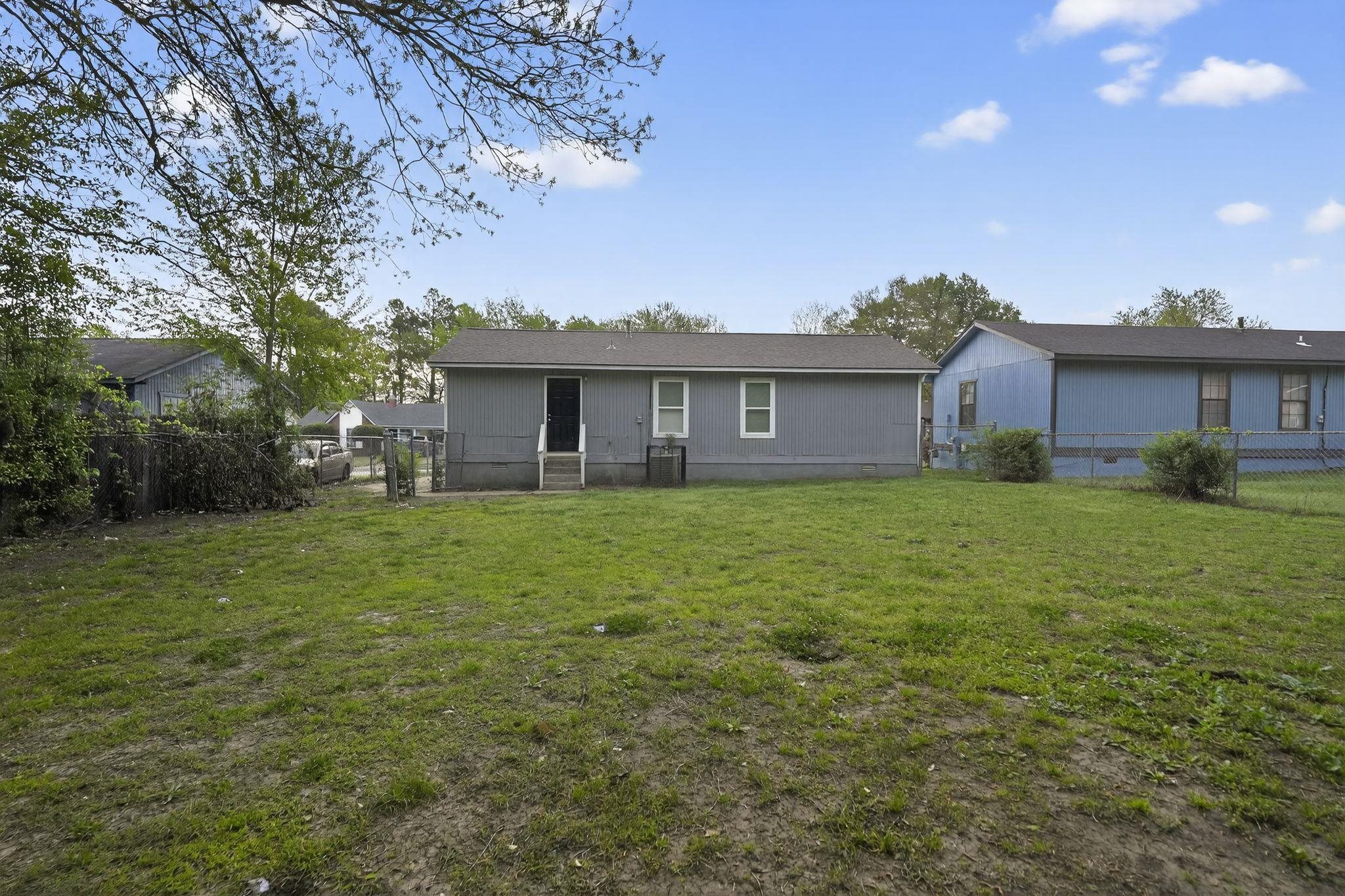 4725 Lofts Road Memphis, TN 38118 - Photo 31 of 32 Rear view of property with crawl space